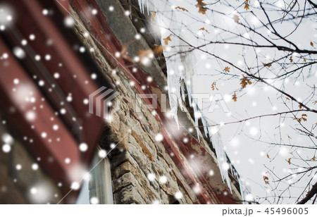icicles hanging from building roof 45496005
