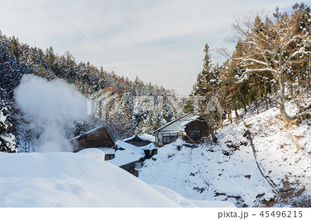 country houses and forest hills in winter, japan 45496215