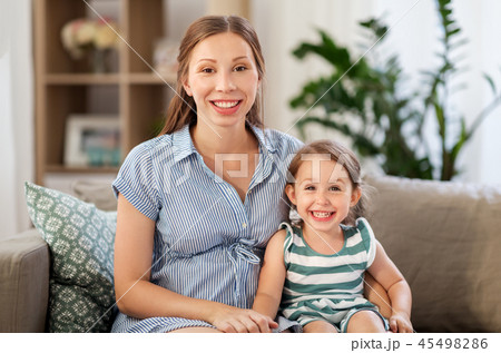 pregnant mother and daughter at home pregnant mother and daughter at home 45498286