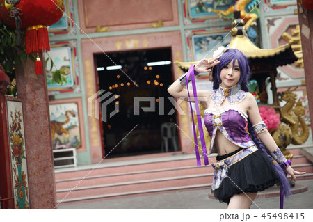 Portrait of asian young woman with purple Chinese dress cosplay with temple 45498415