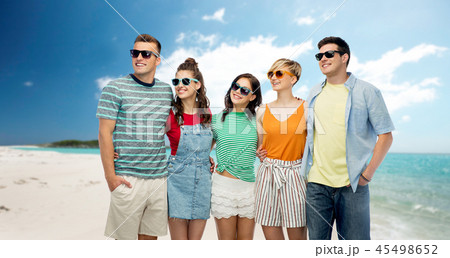 friends in sunglasses over tropical beach friends in sunglasses over tropical beach 45498652