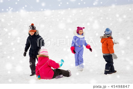 happy little kids playing outdoors in winter happy little kids playing outdoors in winter 45498847