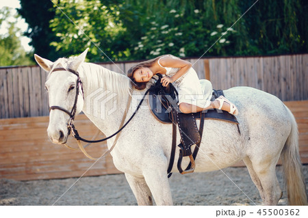 Girl with hourse 45500362