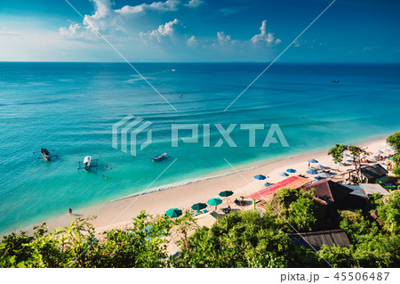 Tropical beach with boats and blue ocean in tropic 45506487