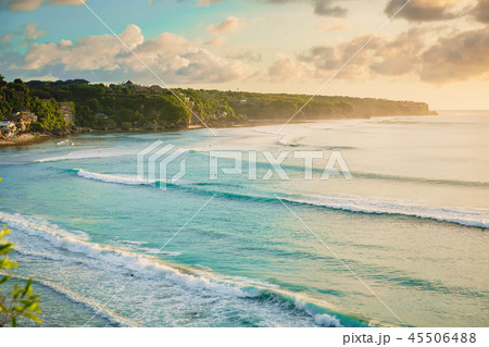 Tropical island and ocean with big waves and sky 45506488