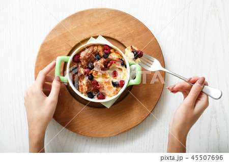 Top view casserole baked cherry and raspberries 45507696