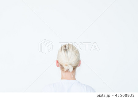 backview woman looking invisible object white 45508935