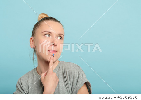 pensive thoughtful woman looking right above pensive thoughtful woman looking right above 45509530