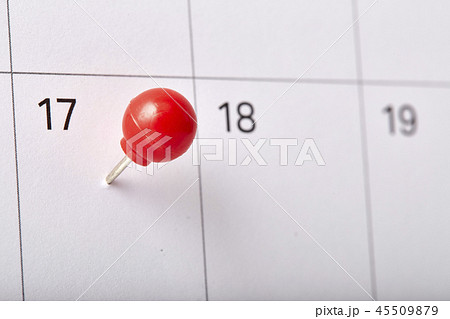 Red thumbtack tax day 201 45509879
