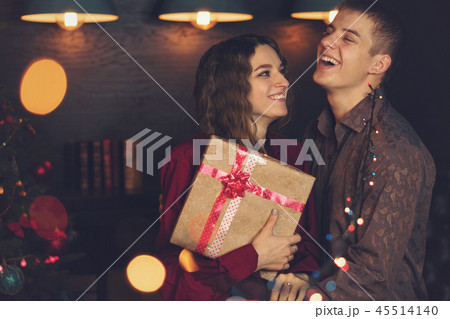 A loving couple celebrates Christmas 45514140