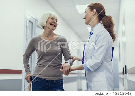 Jolly physician is enjoying conversation with patient Jolly physician is enjoying conversation with patient 45515048