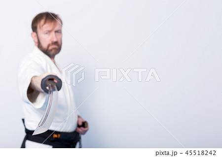 A man with katana on Iaido practice A man with katana on Iaido practice 45518242