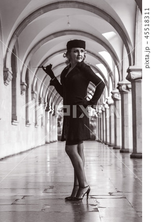 Retro woman on the train station Retro woman on the train station 45518311