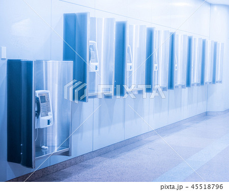 Perspective row of public telephone inside modern building 45518796