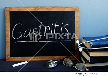 Gastritis written on a blackboard in a hospital. 45519657