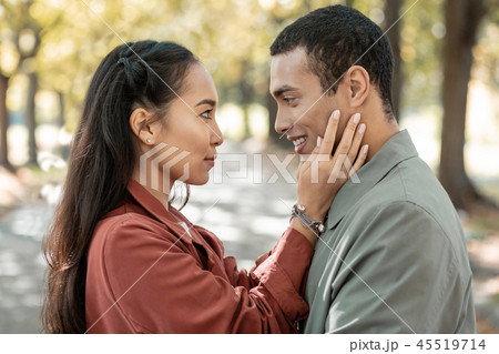 Charming international girl looking into male eyes 45519714