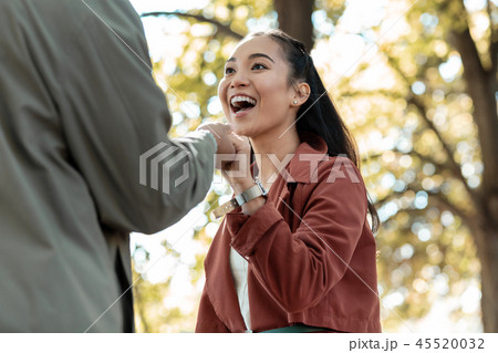 Focused photo on male hand that holding his girlfriend Focused photo on male hand that holding his girlfriend 45520032