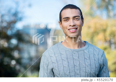 Positive delighted student spending break on nature 45520170