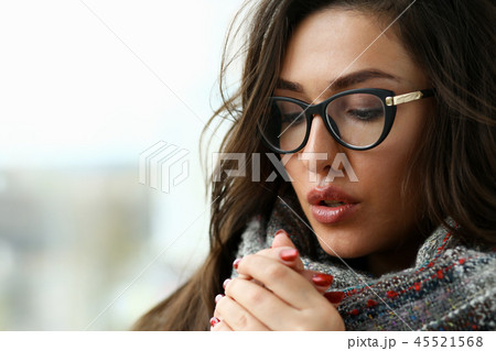 Young beautiful woman in a scarf portrait is 45521568