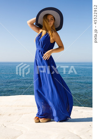 Blond woman in blue 45522912