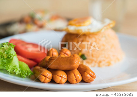 fried rice with sausage and fried egg fried rice with sausage and fried egg 45535035