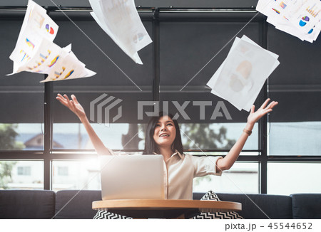 Asian beauty businesswoman throwing paperwork into the air. Succ Asian beauty businesswoman throwing paperwork into the air. Succ 45544652