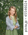 The child smiles shyly at the large portrait 1814. 45546024