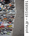 Old metal wrench, key, pliers lying on the asphalts at flea market in Kiev, Ukraine 45546891