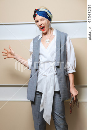 Screaming lady. Portrait of a girl shouting loud. Screaming lady. Portrait of a girl shouting loud. 45548256