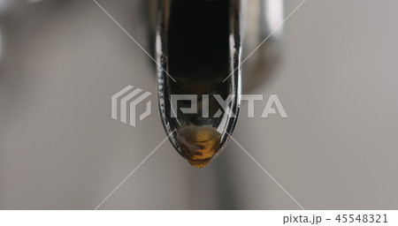 closeup shot of espresso machine brewing coffee closeup shot of espresso machine brewing coffee 45548321