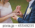 The gentle embrace of the newlyweds palms 1828. 45549235