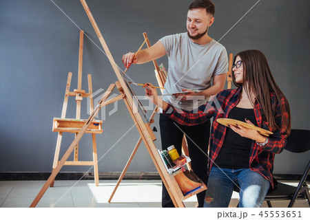 Group of students painting at art lessons 45553651