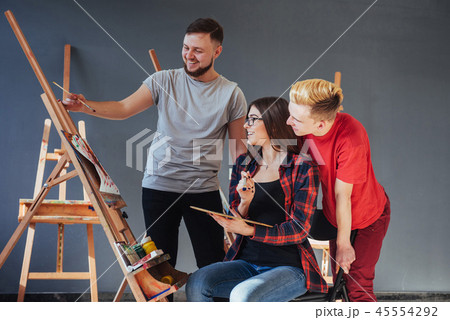 Creative artists have designed a colorful picture painted on canvas with oil paints in the studio 45554292