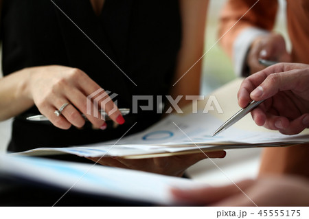 Group of people hold in arms financial papers 45555175