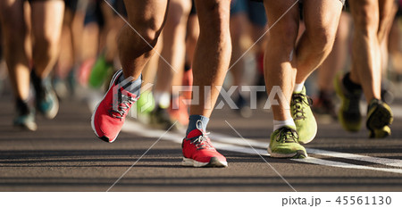 Marathon running race, large group of runners 45561130