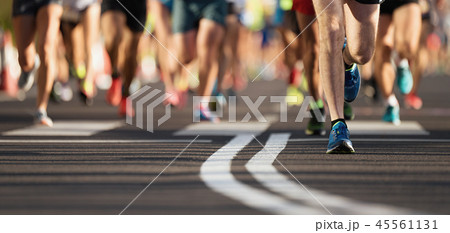Marathon running race, large group of runners 45561131