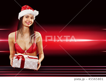 Santa girl delivering present 45565801
