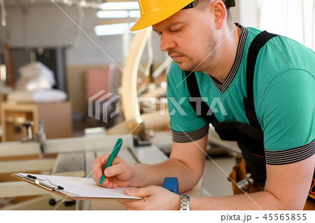 Portrait of young attractive man in work 45565855