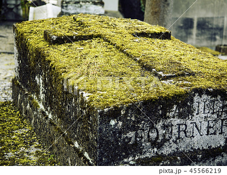 Tombstones in cemetery at dusk, gothic style crosses noone Tombstones in cemetery at dusk, gothic style crosses noone 45566219