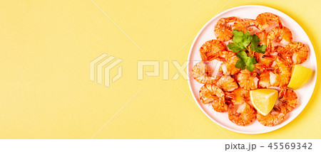 Grilled shrimps with lemon parsley and garlic Grilled shrimps with lemon parsley and garlic 45569342
