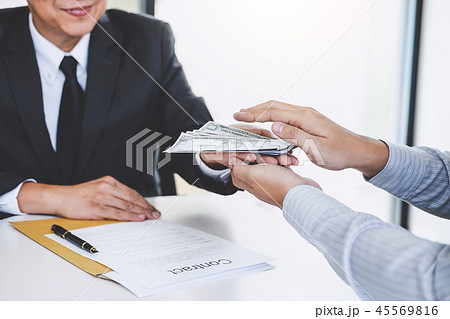 Bribery and corruption concept, bribe in the form of dollar bill 45569816