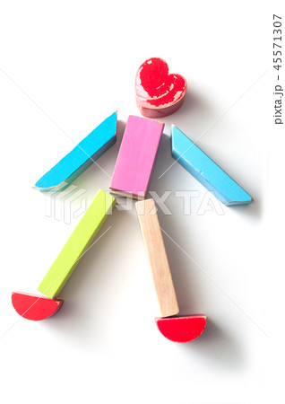 character on wooden blocks on white background 45571307