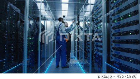 Two men working in a data center Two men working in a data center 45571836