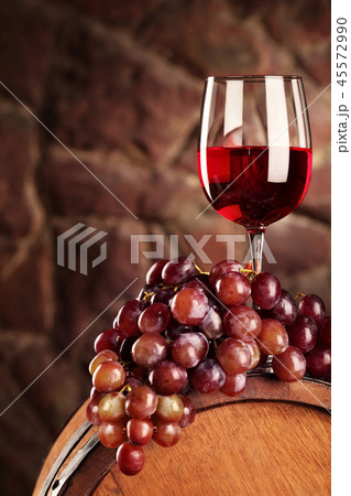 Red wine.Still life with glass of red wine, grapes 45572990