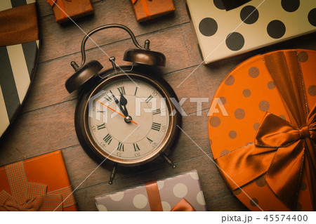 Vintage clock on christmas background Vintage clock on christmas background 45574400