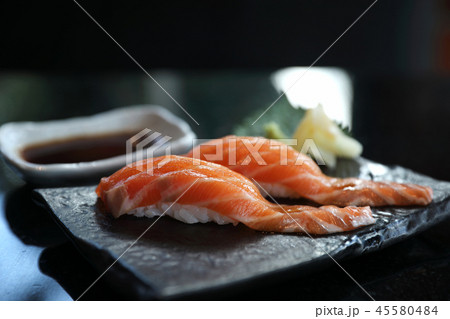 Salmon sushi on black plate japanese food Salmon sushi on black plate japanese food 45580484