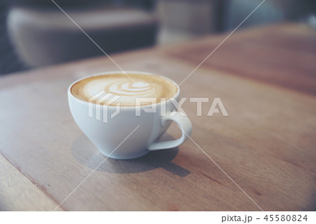 cappuccino or Latte art coffee made from milk on the wood table in coffee shop cappuccino or Latte art coffee made from milk on the wood table in coffee shop 45580824