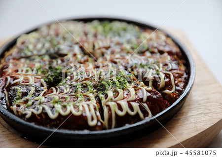 Japanese food okonomiyaki , Japanese pizza on wood plate Japanese food okonomiyaki , Japanese pizza on wood plate 45581075