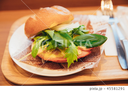Ham cheese sandwich with salad on wood background Ham cheese sandwich with salad on wood background 45581291