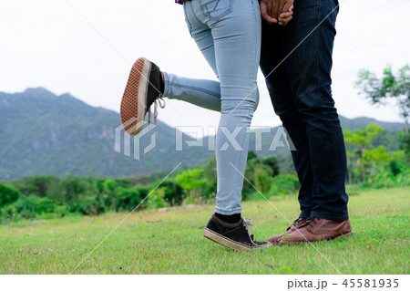 Happy couple take a romantic walk on the hills. Happy couple take a romantic walk on the hills. 45581935